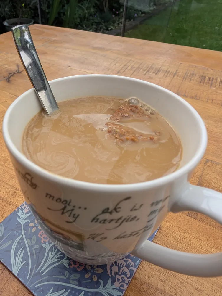 Softened crumb floating in the coffee, this is done